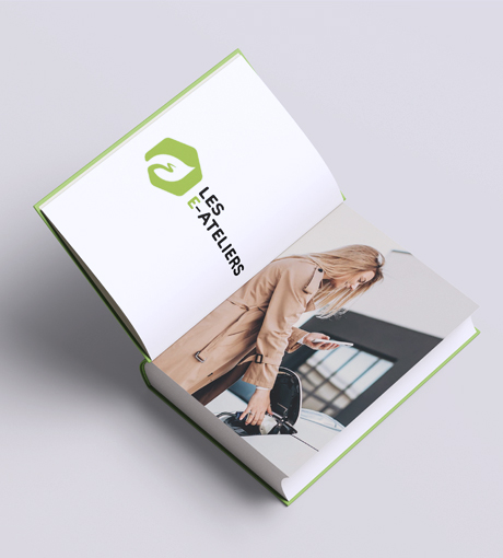 livre ouvert représentant le book d'animation des e-ateliers